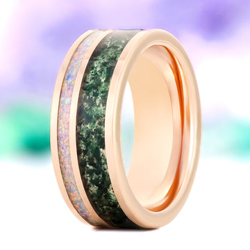 Moss agate and fire opal men's wedding band in polished rose gold tungsten carbide, 8mm, standing view showing the twin green moss agate and white fire opal channels