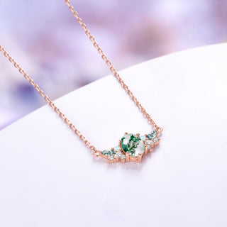 Rose gold vermeil moss agate cluster necklace shown at an angle with its 18 inch cable chain