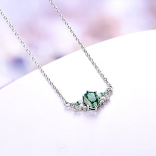 Sterling silver moss agate cluster necklace shown at an angle with its 18 inch cable chain