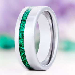 Natural malachite men's wedding band in silver tungsten carbide, 8mm, standing view showing the off-set green inlay and polished interior