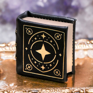 Night Court handmade leather book ring box in black and gold by Aquamarise with embossed cover design