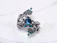 Non-traditional engagement ring by Aquamarise shown in a ring style banner