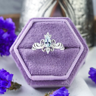 Odette Pear Aquamarine Tiara Engagement Ring in Sterling Silver in a lilac velvet ring box