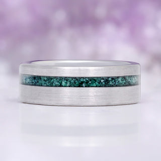 Close-up of the crushed green moss agate channel set flush in the brushed matte tungsten band