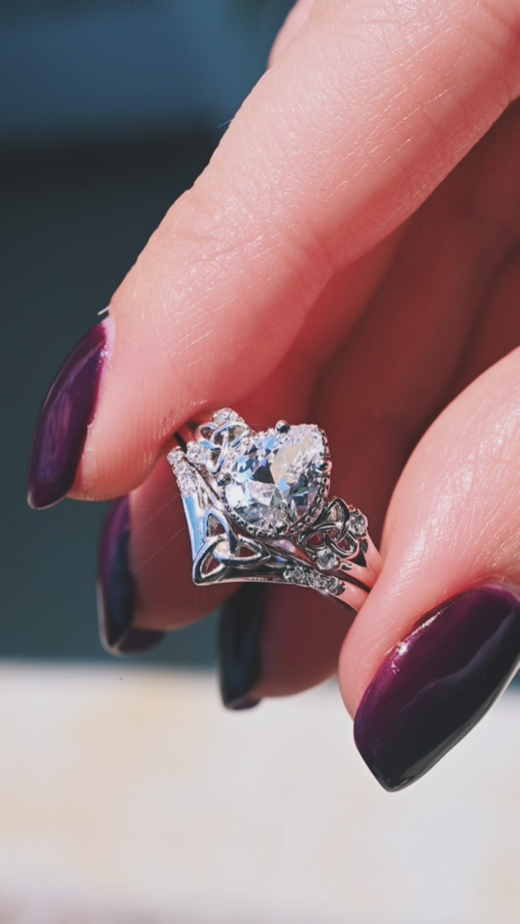 Video of a Celtic white sapphire ring set by Aquamarise, shown in motion