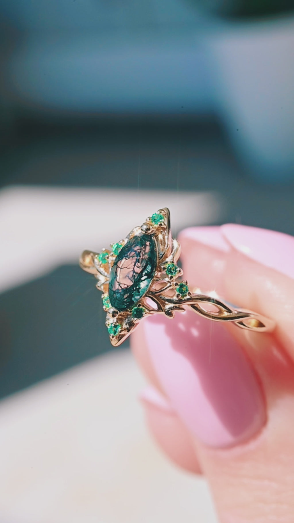 Video of the Fairy Queen Moss Agate & Emerald Lotus Engagement Ring in Solid 14K Yellow Gold by Aquamarise Gold