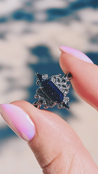 Ravenna Hexagon Starry Night and Black Onyx Engagement Ring in Black Ruthenium, video of the blue sandstone sparkle turning in the light