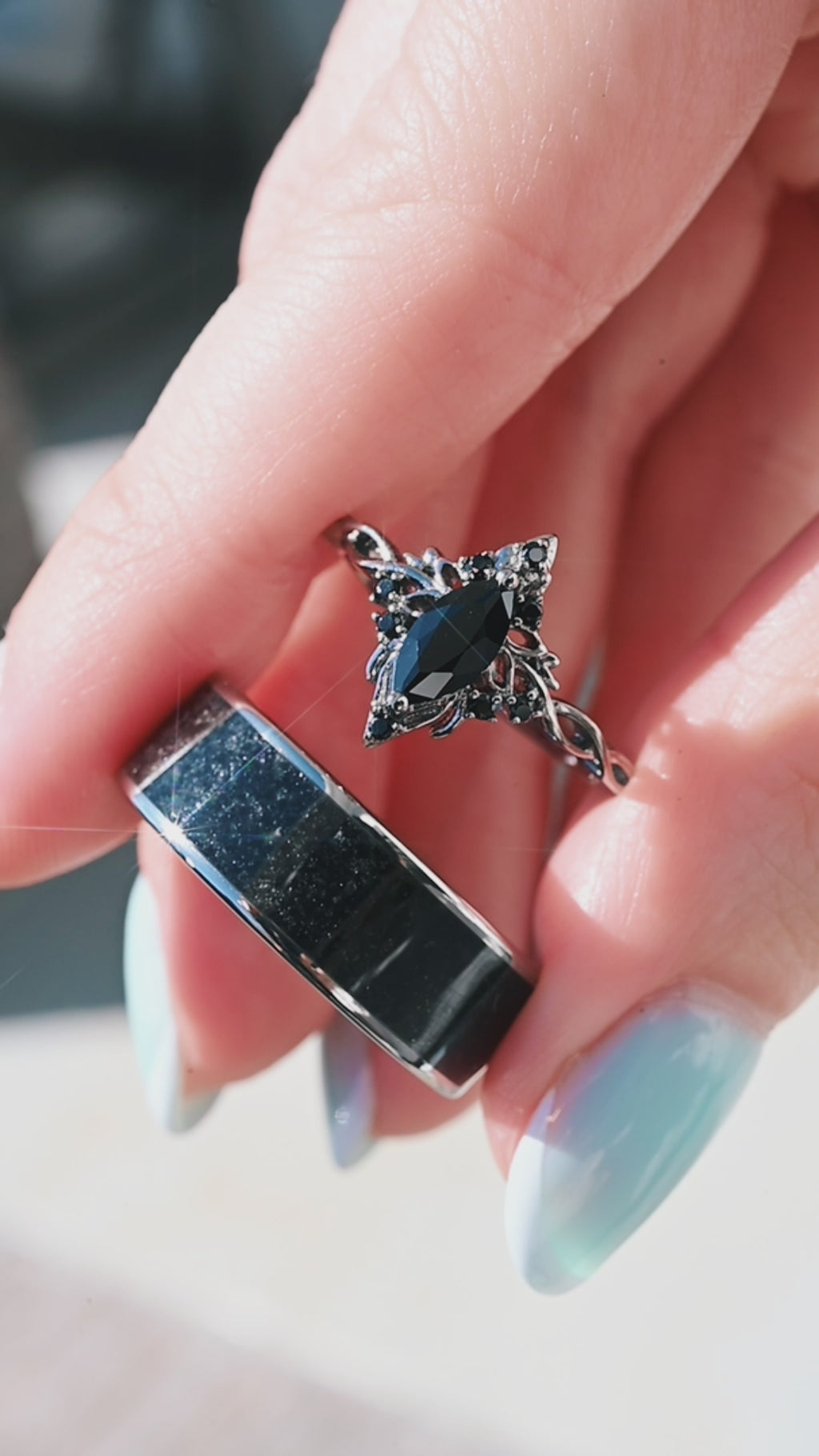 Video of the Shadow Queen black onyx couples ring set by Aquamarise, shown in motion