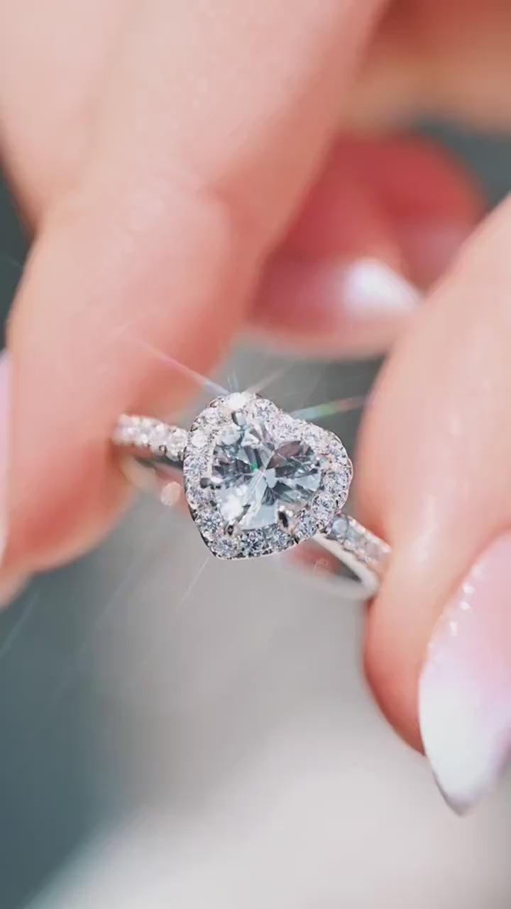 Video of a natural white sapphire ring by Aquamarise, shown sparkling in motion