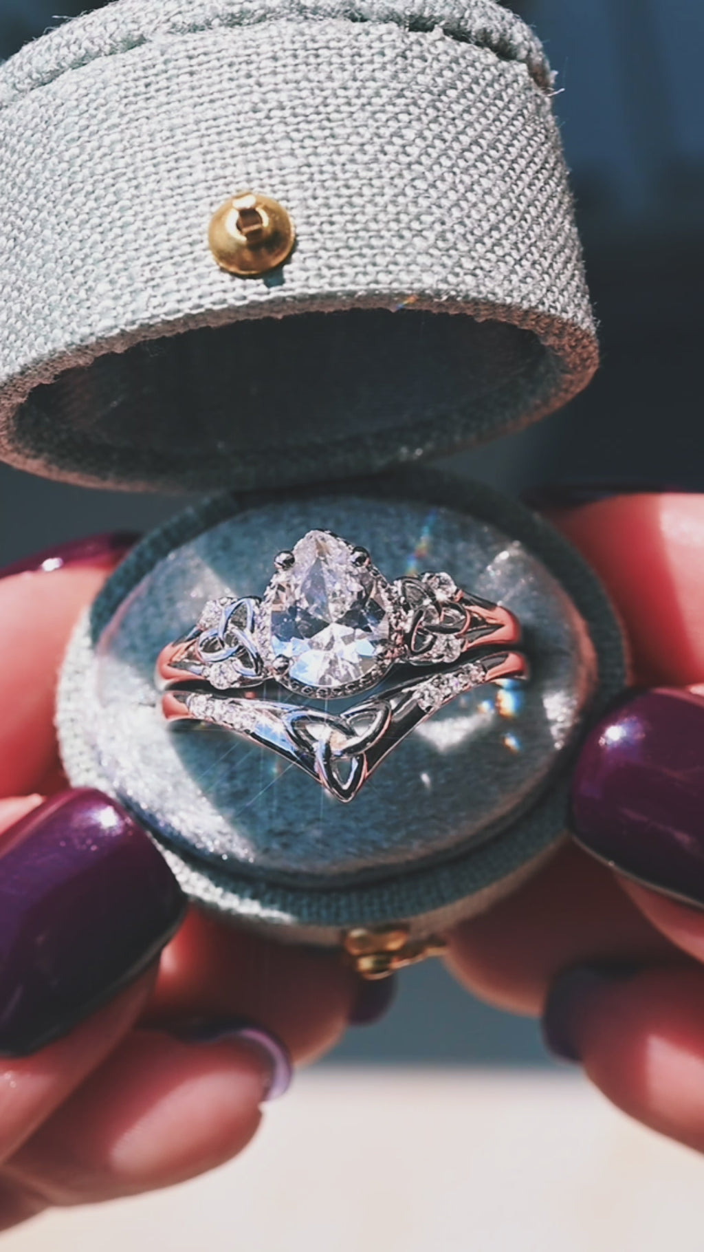 Video of a white sapphire engagement ring set by Aquamarise, shown in motion