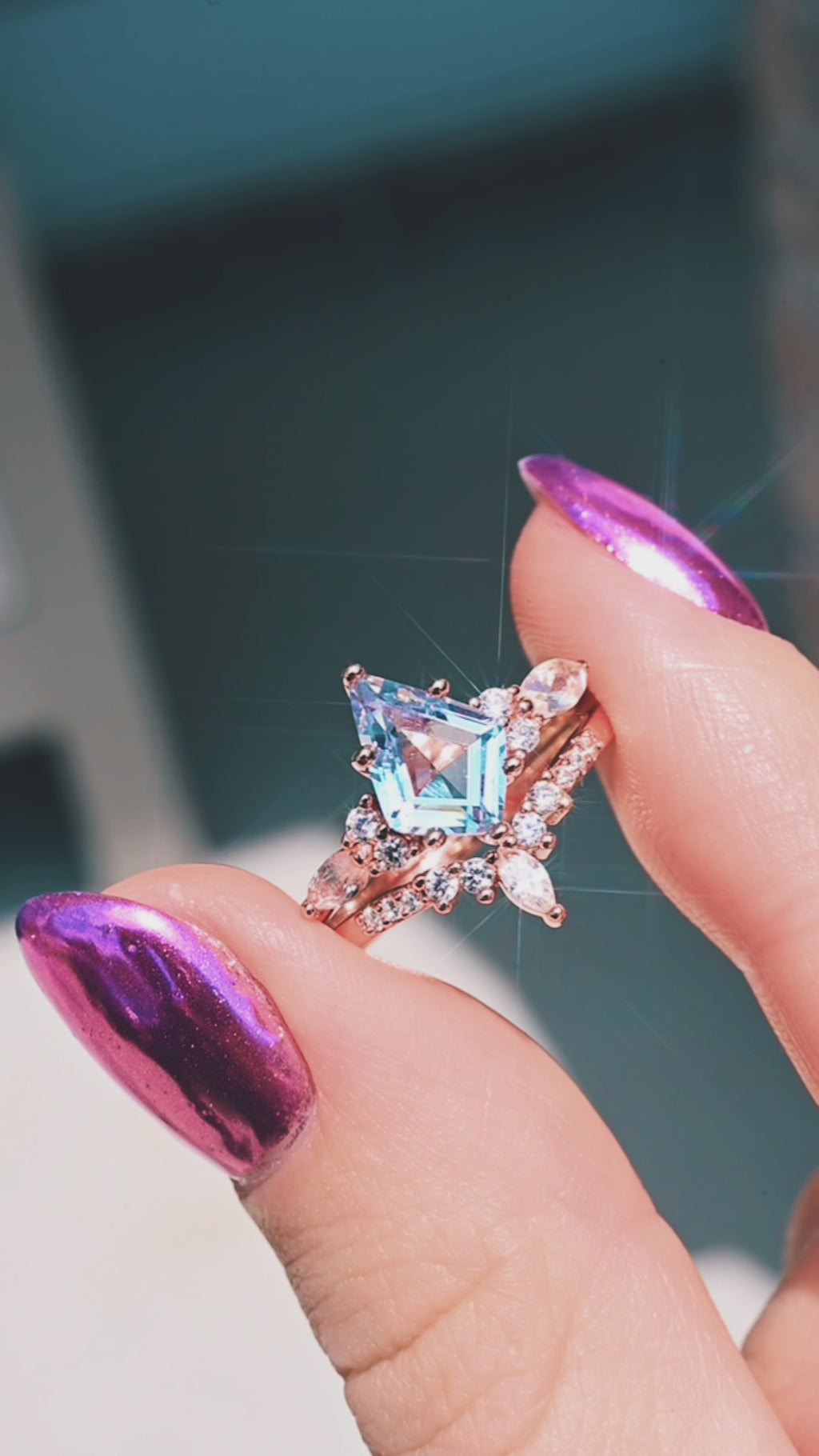 Product video of the Skye Kite Aquamarine and Moonstone Ring Set in 14K Solid Rose Gold by Aquamarise, showing the kite-cut aquamarine on a rose gold band.