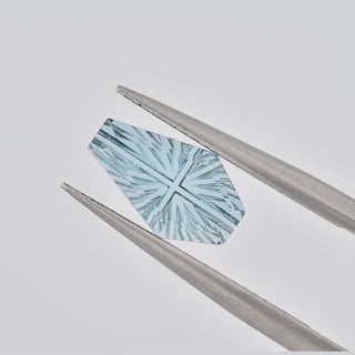 Natural Sky Blue Topaz coffin 6 x 10 mm Faelight Cut video, turning to show the starburst flashes