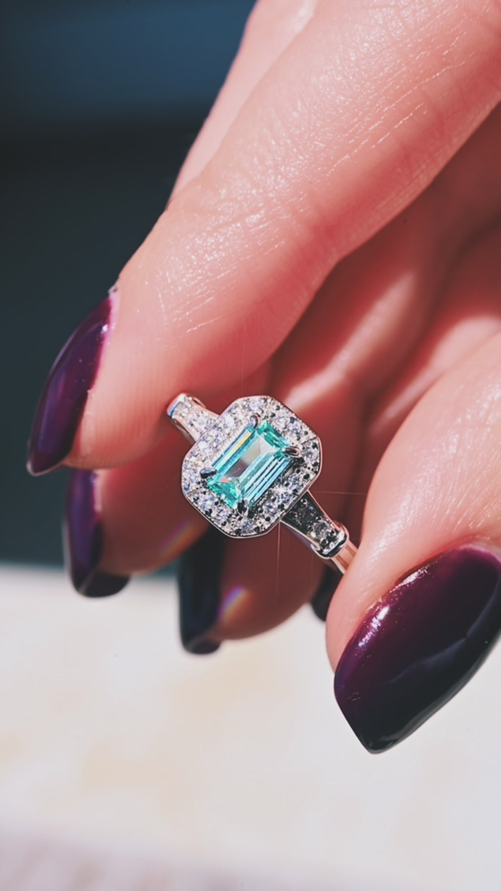Video of a vintage emerald cut aquamarine ring by Aquamarise, shown in motion