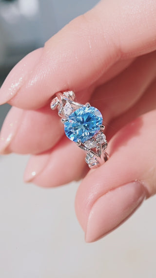 Oval Cut Ice Blue Moissanite Ring in Sterling Silver