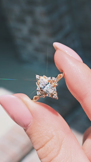 Video of the marquise butterfly engagement ring in solid 14K yellow gold by Aquamarise Gold, shown from multiple angles