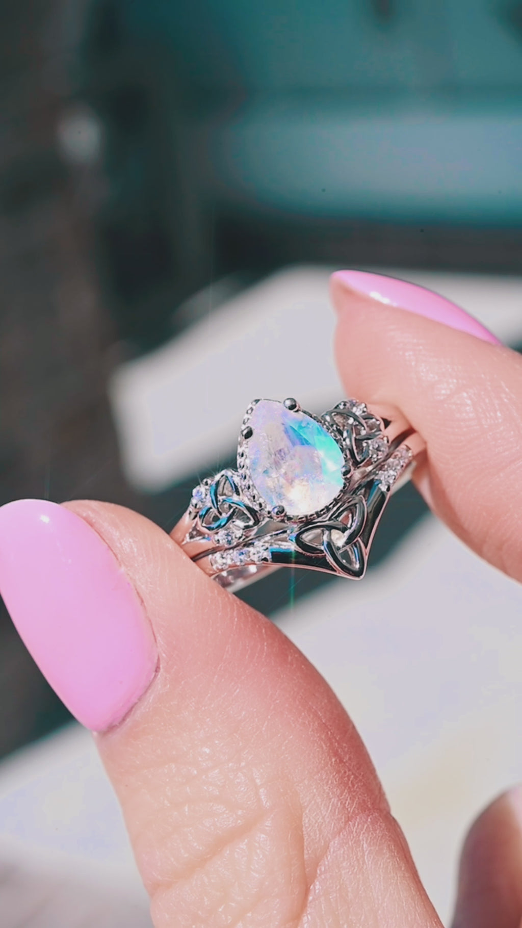 Video of a Celtic moonstone ring set by Aquamarise, shown in motion