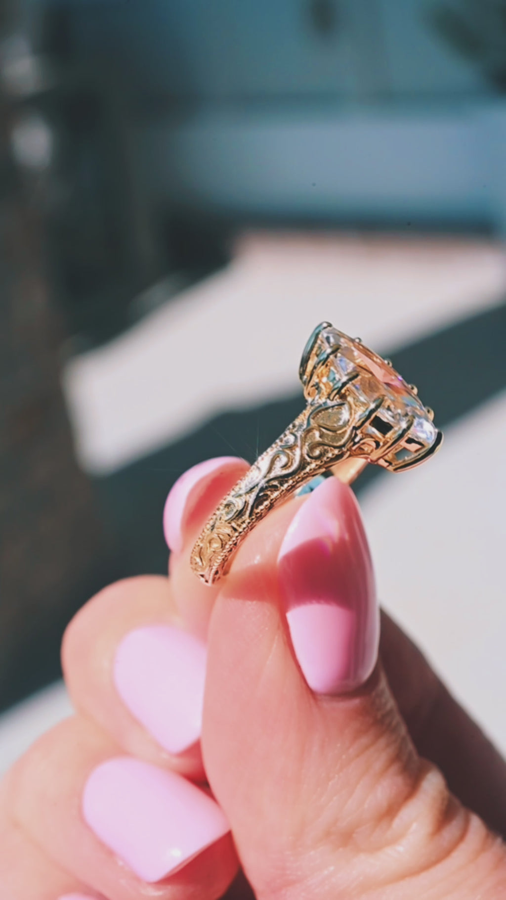 Product video of the Marquise Victorian Gothic Filigree Engagement Ring in Solid 14K Yellow Gold by Aquamarise, showing the marquise diamond within scrollwork filigree.