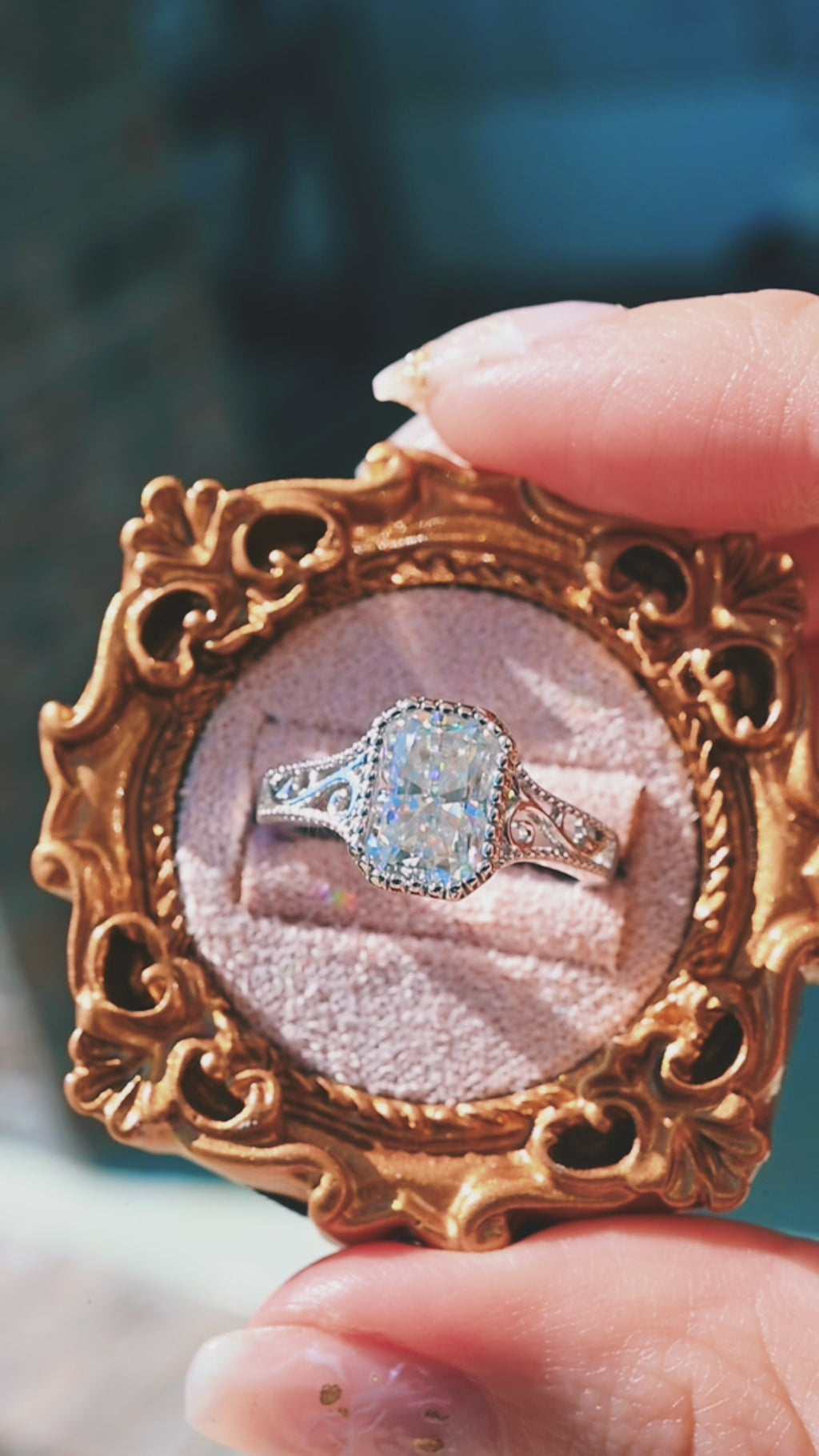 Product video of the Lab Grown Diamond Engagement Ring in 14K White Gold by Aquamarise, showing the radiant-cut lab-grown diamond in a vintage-inspired white gold setting.