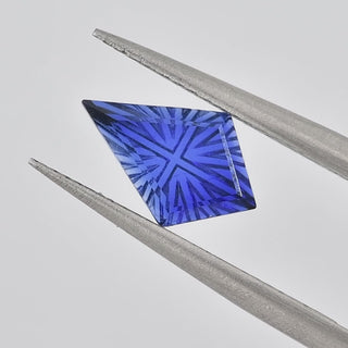 Lab-Grown Blue Sapphire kite 7 x 10 mm Faelight Cut video, turning to show the starburst flashes