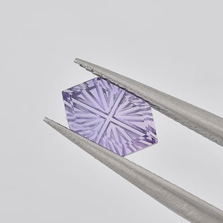 Lab-Grown Lavender Purple Sapphire long hexagon 5 x 9 mm Faelight Cut video, turning to show the starburst flashes