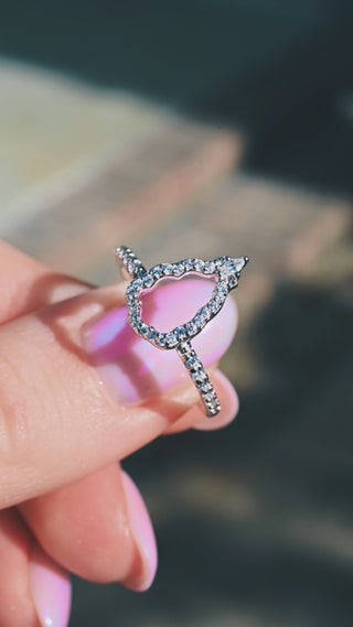 Video of the Fairest lavender sapphire ring set in motion, showing the pavé sparkle and the open halo