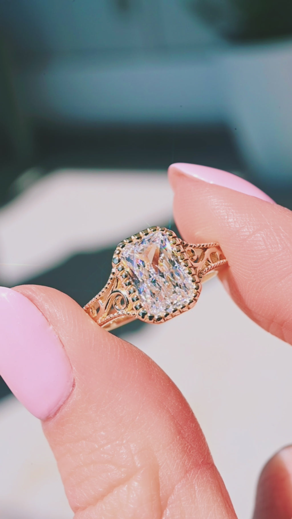 Product video of the Lab Grown Diamond Engagement Ring in Solid 14K Yellow Gold by Aquamarise, showing the radiant-cut lab-grown diamond in a vintage-inspired yellow gold setting.
