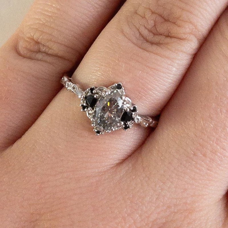 Customer photo of the Esme Gray Moissanite and Black Onyx Ring in sterling silver on a hand, Aquamarise review