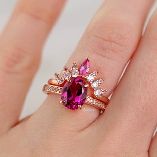 Ava Pink Tourmaline Engagement Ring in 14K Rose Gold Vermeil by Aquamarise, featuring a pear-shaped pink tourmaline with white stone accents on a rose gold vermeil band.