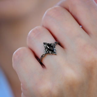 Shadow Queen Black Onyx Lotus Ring in Black Ruthenium worn on the hand