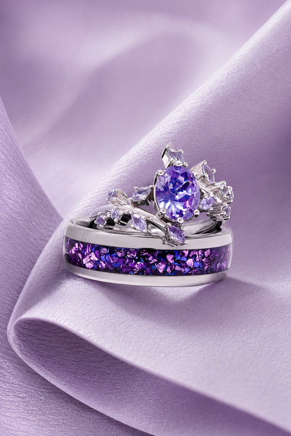 Sterling silver purple gemstone crown engagement ring stacked on a band with crushed purple stone inlay on lilac satin, Aquamarise bridal set collection banner