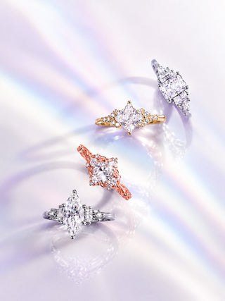 Solid gold and platinum rings by Aquamarise shown in a portrait hero banner