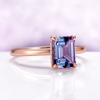 Solitaire Alexandrite Hidden Halo Engagement Ring in 14K Rose Gold Vermeil by Aquamarise, featuring a radiant emerald-cut alexandrite stone with a delicate hidden halo design.