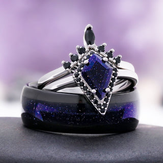 Starry Night and black onyx couples ring set stacked, the kite blue sandstone engagement ring resting on the men's black band with a starry sandstone inlay