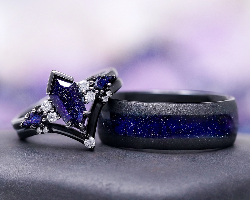 Two rings with purple gemstones on a gray surface with a blurred purple background