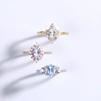 three aquamarine engagement rings march birthstone banner