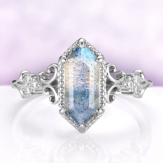 Vesper hexagon labradorite engagement ring in sterling silver, 5 x 12 mm natural labradorite in a milgrain bezel with scrolled cubic zirconia shoulders, front view