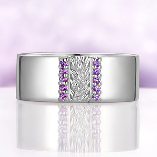 Mens 8mm sterling silver wedding band with a carved leaf panel and two channels of natural amethyst, front view