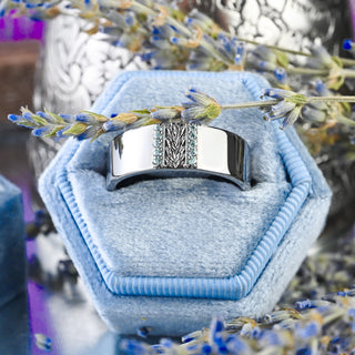 Viridian Leaf & Aquamarine Men's Wedding Band in Black Ruthenium (8mm) in a blue velvet ring box