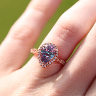 Art Deco Alexandrite Ring in 14K Rose Gold Vermeil by Aquamarise featuring a pear-shaped color-changing stone surrounded by sparkling diamonds on an elegant rose gold band.