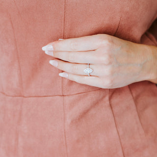 Marquise White Sapphire Halo Ring in Sterling Silver