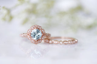 Vintage Cushion Cut Aquamarine Ring in 14k Rose Gold Vermeil by Aquamarise, featuring a cushion aquamarine center with intricate rose gold and diamond halo on a delicate band.