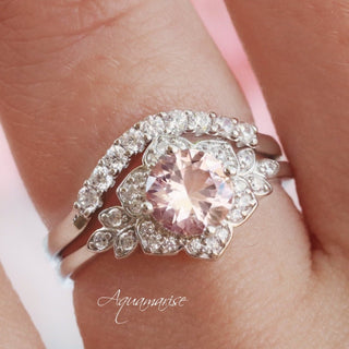 Jasmine Morganite Bridal Ring Set in 14K White Gold by Aquamarise Gold, featuring a round morganite center with floral diamond halo and delicate diamond-accented bands in a nature-inspired design.