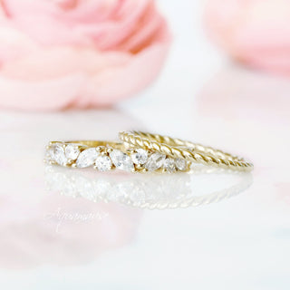 Willow Vintage Marquise Wedding Band in Solid 14K Yellow Gold by Aquamarise Gold featuring marquise and round gemstones in an elegant leaf-inspired design with a twisted gold band.