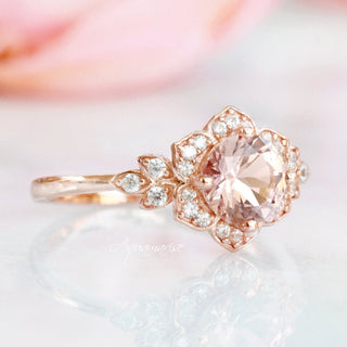 Jasmine Natural Morganite Ring Set in 14K Solid Rose Gold by Aquamarise Gold, featuring a peachy-pink morganite center with a scalloped pavé halo of moissanite accents.