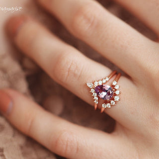 Lunette Teardrop Alexandrite Ring Set in 14K Rose Gold Vermeil by Aquamarise featuring a teardrop alexandrite and diamond accents on a rose gold vermeil band, styled on hand against a soft background