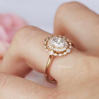 Valentina Simulated Diamond Ring in 14K Yellow Gold Vermeil by Aquamarise, featuring an oval simulated diamond surrounded by a double halo on a polished yellow gold vermeil band.