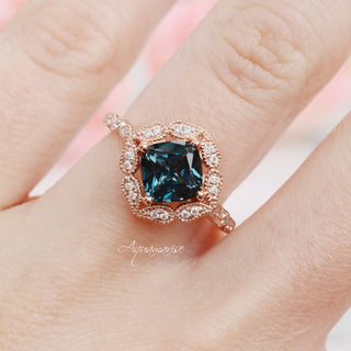 Cushion Cut Natural London Blue Topaz Engagement Ring in 14K Solid Rose Gold by Aquamarise featuring an art deco inspired halo with intricate milgrain and diamond accents.