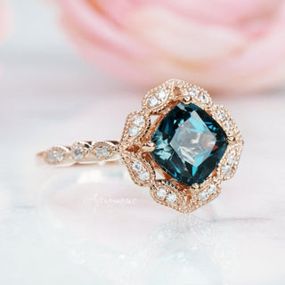 Cushion Cut Natural London Blue Topaz Engagement Ring in 14K Solid Rose Gold featuring an intricate vintage-inspired halo with diamond accents by Aquamarise Gold.