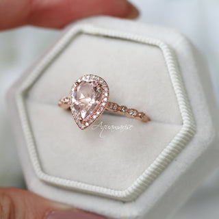 Art Deco Teardrop Morganite Ring in 14K Rose Gold Vermeil by Aquamarise, featuring a pear-shaped morganite center with a diamond halo and delicate rose gold vermeil band.