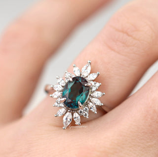 Aurora Alexandrite Ring - Sterling Silver by Aquamarise featuring an oval alexandrite center with marquise and round simulated diamonds in a vintage-inspired halo setting on a delicate band.